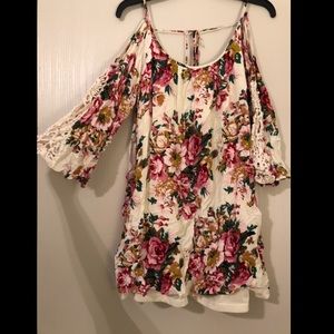 Cute flowy floral dress, with cutout shoulders